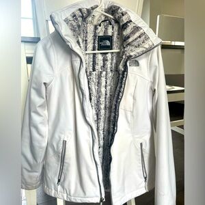 Small North Face ski jacket, white with detachable hood. Some discoloration